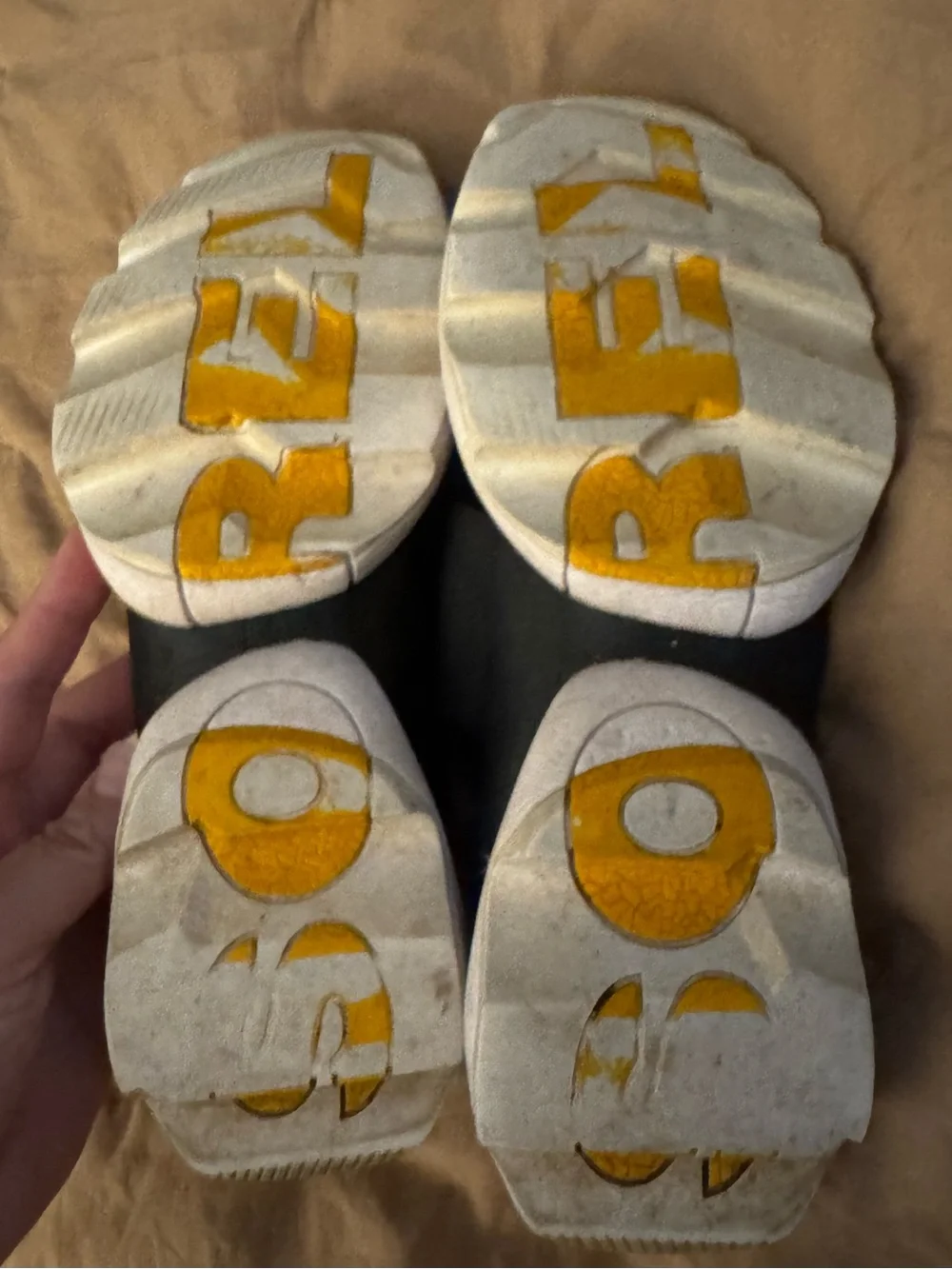 Sorel Black Slip-On Athletic Sneakers with White Soles and Yellow Heel Tab
